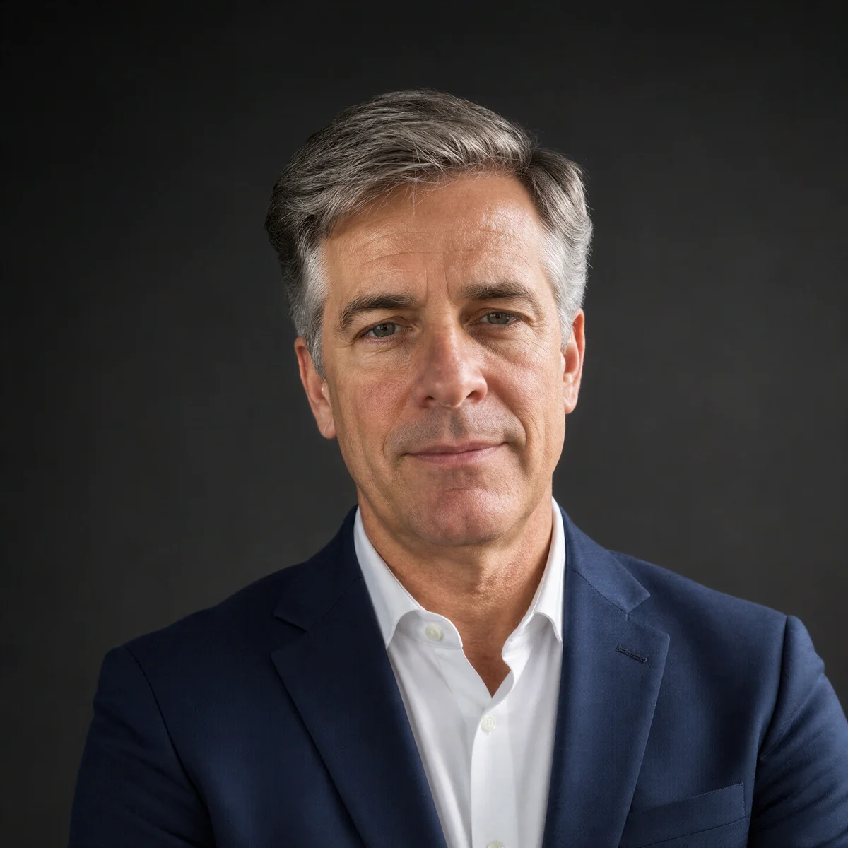 Selfie transformed into a Executives headshot — Business Formal, Studio Gray